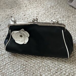 Elegant Black Clutch with White Flower Accent Pelle Wilson Leather